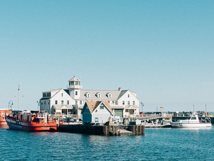 A picturesque view of a marina in Chicago with boats and a clear blue sky, perfect for travel and tourism.